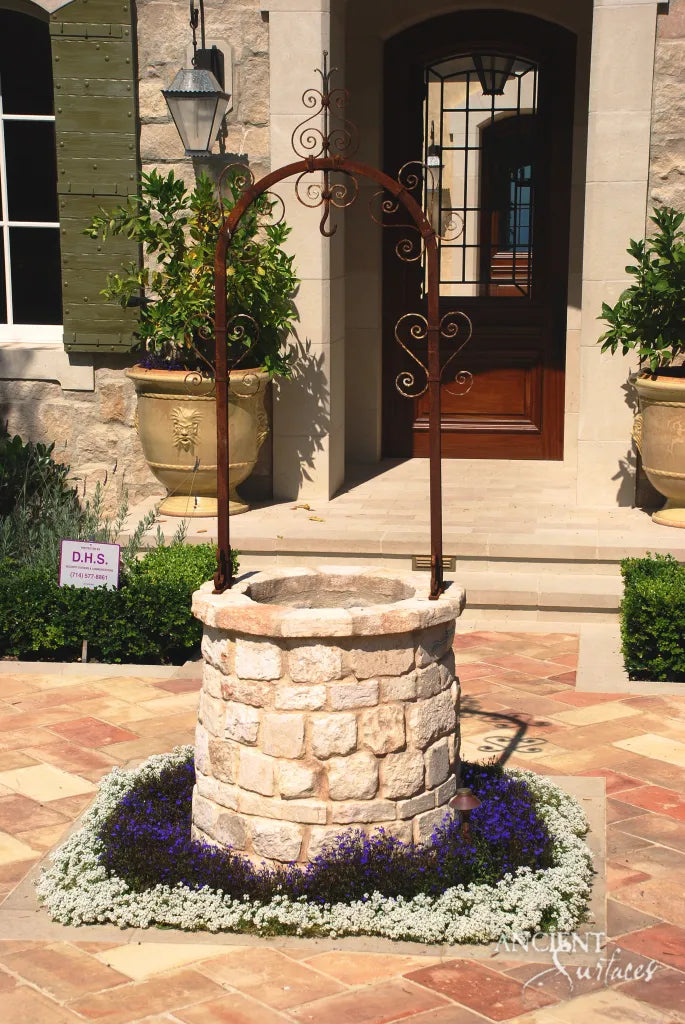 reclaimed_antique_limestone_garden_wells_hand_carved_architectural_stone_ironwork_ancient_surfaces
