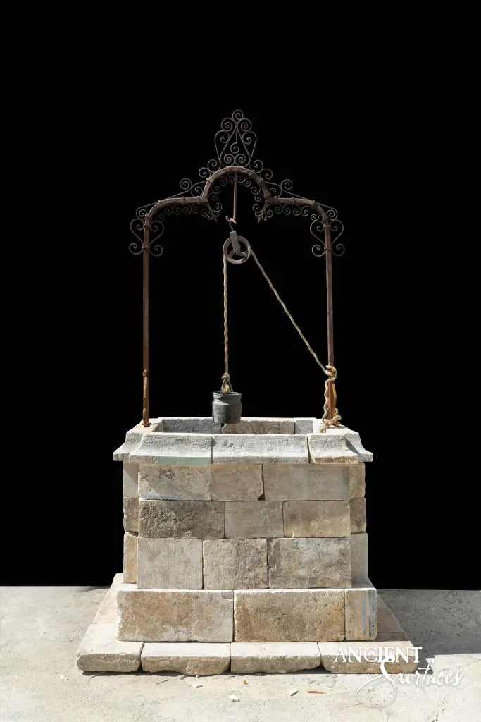 reclaimed_antique_limestone_garden_wells_hand_carved_architectural_stone_ironwork_ancient_surfaces